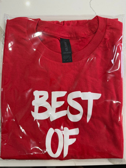 Red t-shirt with 'BEST OF' text in white, folded and in clear plastic packaging.